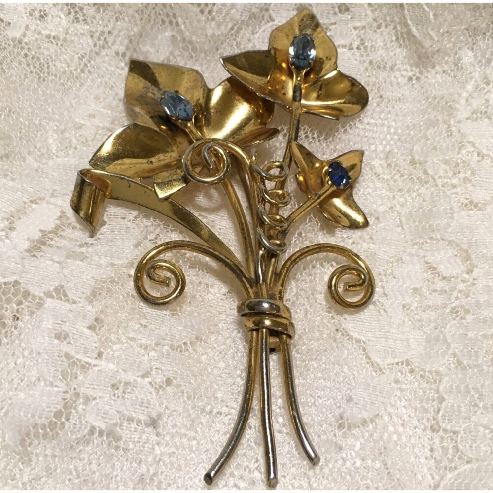 Vintage Brooch Gold Tone marked Sterling Blue Rhinestone Floral Spray
